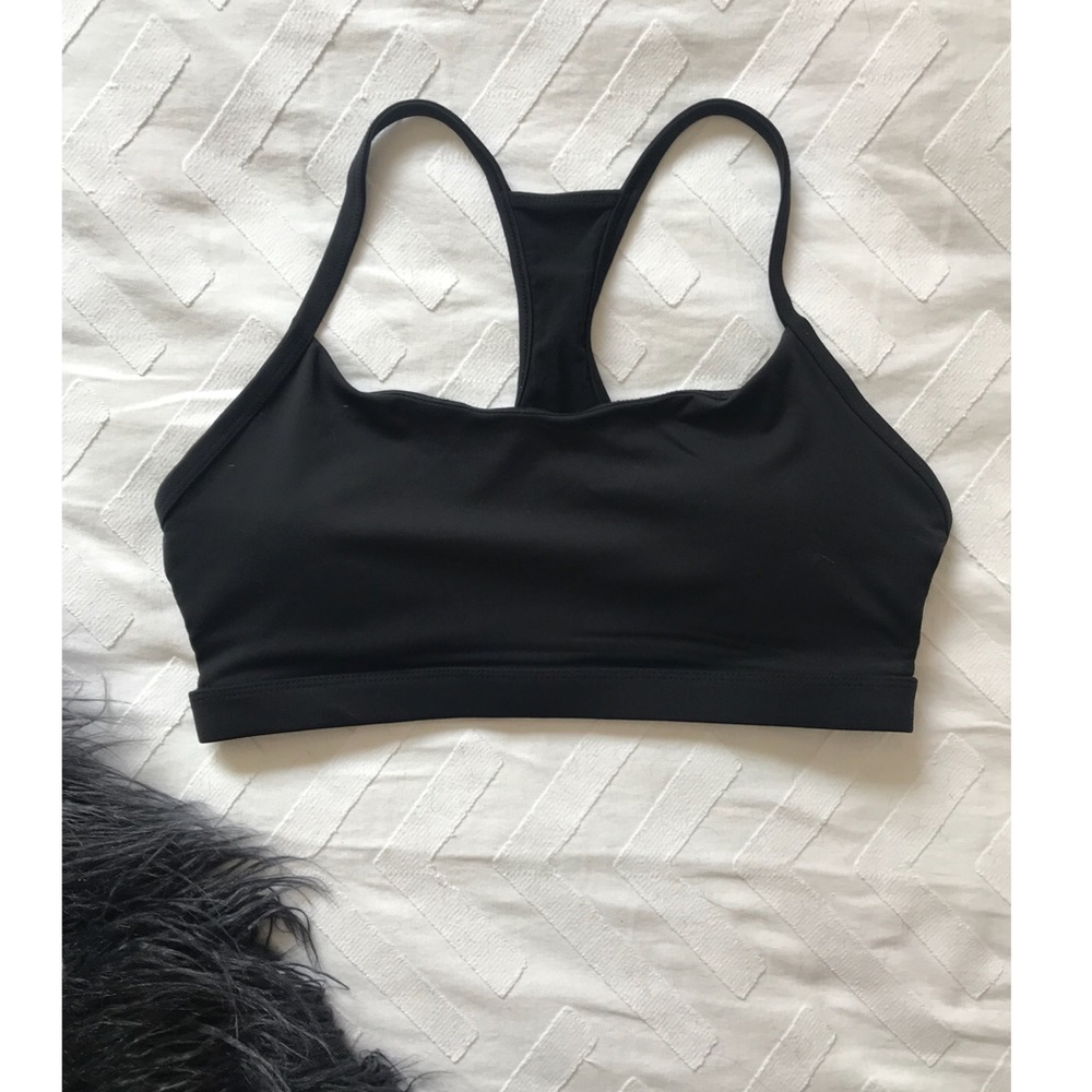 Fabletics black sports bra, strappy on the sides,